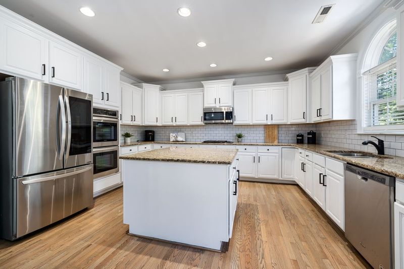 Bright modern kitchen with refinished cabinets