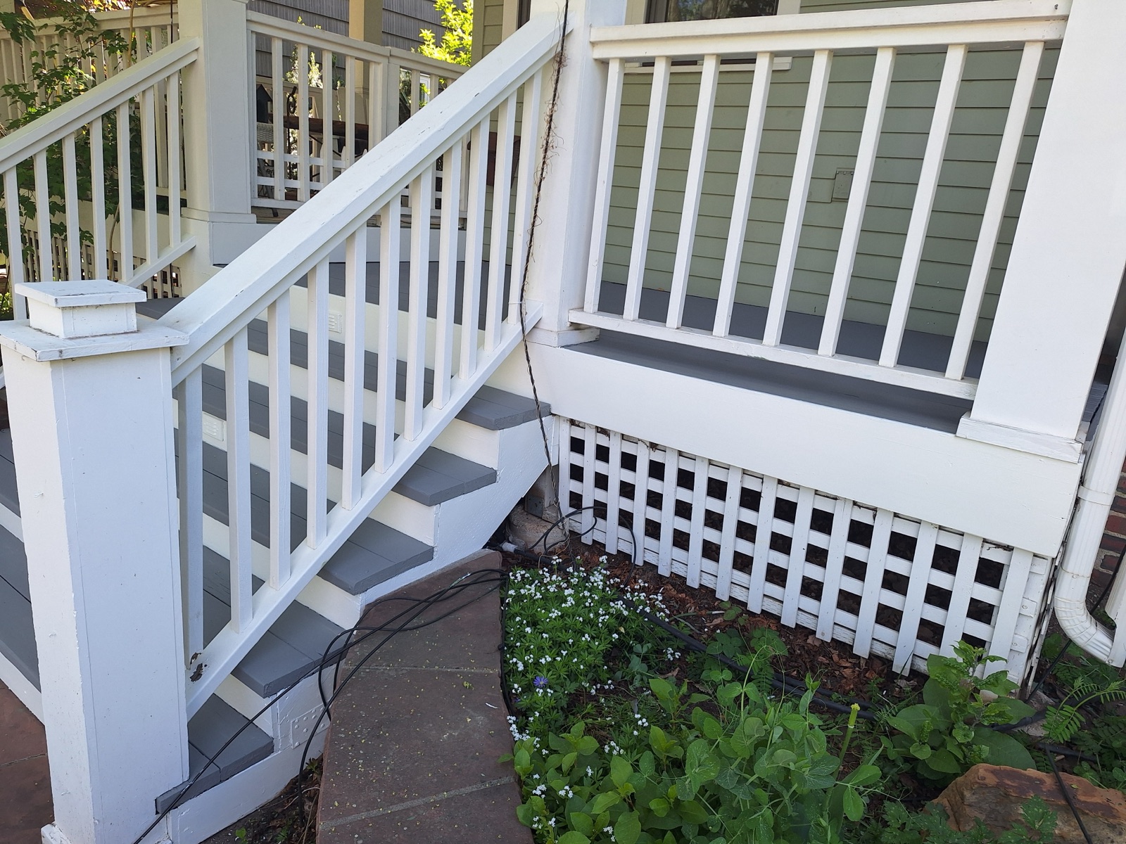 After: freshly painted porch deck and stairs by JEI Painting